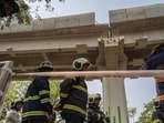 iMumbai, India - February 14, 2026: A portion of a Metro rail track pillar in north-east Mumbai’s Mulund West collapsed on Wednesday. At least 3 persons could be injured in the incident. The track, from which a slab fell, was under construction. The incident reportedly occurred along LBS Marg in Mumbai, India, on Saturday, February 14, 2025. (Photo by Satish Bate/ Hindustan Times) (Hindustan Times) iMumbai, India - February 14, 2026: A portion of a Metro rail track pillar in north-east Mumbai’s Mulund West collapsed on Wednesday. At least 3 persons could be injured in the incident. The track, from which a slab fell, was under construction. The incident reportedly occurred along LBS Marg in Mumbai, India, on Saturday, February 14, 2025. (Photo by Satish Bate/ Hindustan Times) (Hindustan Times)