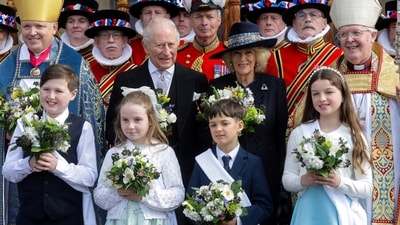 Members of the Yeomen of the Guard, Britain's King Charles, Queen Camilla and The Right Reverend Gregory Cameron, Bishop of St Asaph pose for a formal photograph after the Royal Maundy Service at St Asaph Cathedral, in St Asaph, Wales, Britain, April 2, 2026.  Chris Jackson/Pool via REUTERS (via REUTERS)