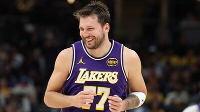 Luka Doncic #77 of the Los Angeles Lakers celebrates after a basket against the Indiana Pacers at Gainbridge Fieldhouse (Getty Images via AFP) Luka Doncic #77 of the Los Angeles Lakers celebrates after a basket against the Indiana Pacers at Gainbridge Fieldhouse (Getty Images via AFP)