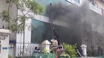 Officials said the fire started at a commercial flour mill and packaging firm in the basement of the building due to a short-circuit and it spread to all upper floors. Officials said the fire started at a commercial flour mill and packaging firm in the basement of the building due to a short-circuit and it spread to all upper floors.