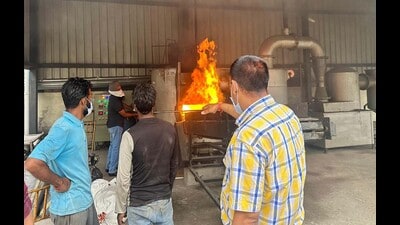 Police dispose of narcotics recovered in drug peddling cases in Ludhiana on Friday. (HT Photo)