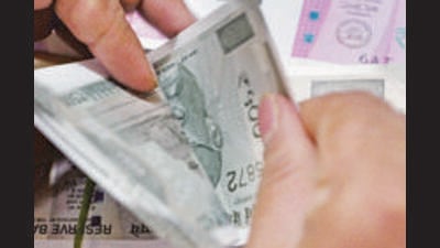 The scheme will provide ₹1,000 financial assistance to all eligible women above 18 years of age and ₹1,500 to women from Scheduled Castes. (AFP File) The scheme will provide ₹1,000 financial assistance to all eligible women above 18 years of age and ₹1,500 to women from Scheduled Castes. (AFP File)