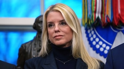 Attorney General Pam Bondi listens as President Donald Trump speaks at an event on addiction recovery in the Oval Office of the White House. (AP File) Attorney General Pam Bondi listens as President Donald Trump speaks at an event on addiction recovery in the Oval Office of the White House. (AP File)