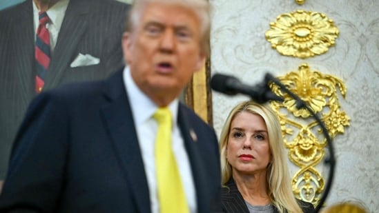 US Attorney General Pam Bondi listens as President Donald Trump speaks during a news conference in the Oval Office of the White House in Washington, DC, on October 15, 2025. (AFP)