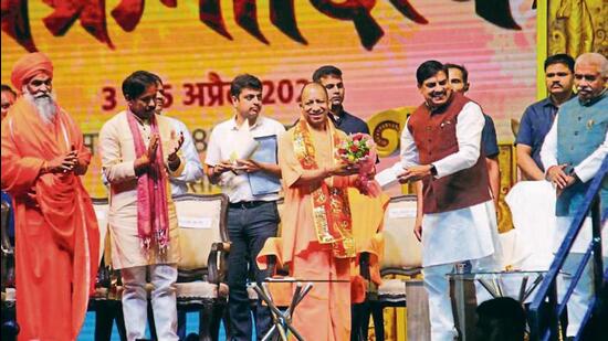 Uttar Pradesh chief minister Yogi Adityanath and his Madhya Pradesh counterpart Mohan Yadav at the inauguration of the epic play ‘Samrat Vikramaditya’, in Varanasi on Friday. (Rajesh Kumar/HT)