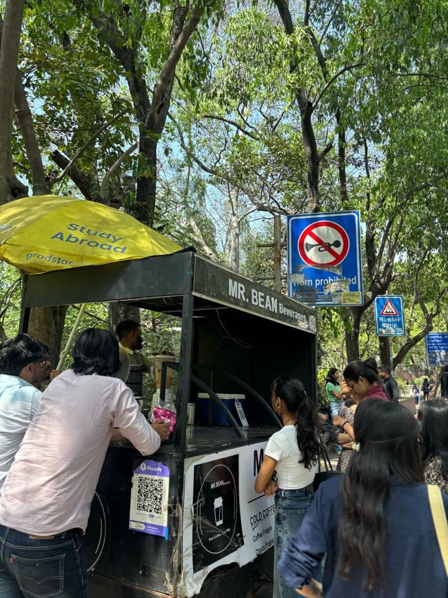 Outside the Arts Faculty gate, Mr Bean Beverage has become a daily ritual for many. Outside the Arts Faculty gate, Mr Bean Beverage has become a daily ritual for many.