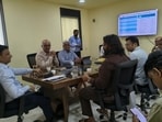 A review meeting regarding the Andra and Bhama Askhed water supply project was held in the presence of PCMC commissioner Vijay Suryawanshi on Friday. (HT)