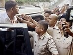AIMIM leader Mofakkerul Islam being produced in court, escorted by police personnel into a vehicle outside the court premises amid strong media presence, in Malda.