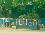 A woman shared a photo of a Bengaluru stall selling coconut water at  <span class='webrupee'>₹</span>180 per litre.