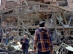 Iran war news highlights: Media representatives gather around the damaged building of the Shahid Beheshti University following a strike, in Tehran on April 4, 2026. US-Israeli strikes have hit more than 30 universities across Iran since the war broke out in late February, Iran's science minister said on April 4.