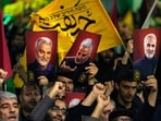 Iranians holding up posters of the late Islamic Revolutionary Guard Corps (IRG) chief Gen Qassem Soleimani, who was killed in a US drone attack in 2020, during an anti-Israeli gathering in 2024. He remains a folk hero since. 