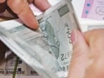The scheme will provide  <span class='webrupee'>₹</span>1,000 financial assistance to all eligible women above 18 years of age and  <span class='webrupee'>₹</span>1,500 to women from Scheduled Castes. (AFP File)
