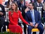 Donald Trump Jr. with his partner Bettina Anderson  (AP Photo/Mark Schiefelbein)