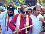 Congress MP Shashi Tharoor encountered a hostile group while campaigning in Wandoor, leading to two arrests ahead of the Kerala Assembly elections. 