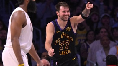 Los Angeles Lakers guard Luka Doncic (77) reacts after a basket in the second half against the Cleveland Cavaliers (IMAGN IMAGES via Reuters Connect)