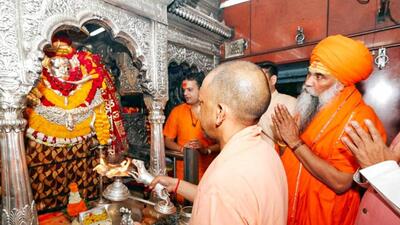 Uttar Pradesh chief minister Yogi Adityanath offers prayers at the Kaal Bhairav temple in Varanasi on Saturday. (ANI PHOTO)