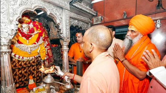 Uttar Pradesh chief minister Yogi Adityanath offers prayers at the Kaal Bhairav temple in Varanasi on Saturday. (ANI PHOTO)
