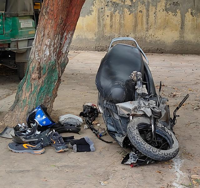 The mangled remains of the scooter. (HT) The mangled remains of the scooter. (HT)
