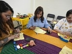 People seen stitching during the session. (Sanjeev Verma/Hindustan Times)