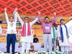 Tripura Chief Minister Manik Saha joins hands during public meeting at Gandatwisa in Dhalai on Saturday. (@DrManikSaha2 X)