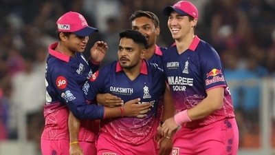 Rajasthan Royals' Tushar Deshpande celebrates with teammates after taking the wicket of Gujarat Titans' Rashid Khan (REUTERS)