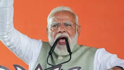 তৃণমূলকে 'মহাজঙ্গলরাজ' তোপ PM মোদীর (PTI Photo/Swapan Mahapatra) (PTI03_22_2026_000155A) তৃণমূলকে 'মহাজঙ্গলরাজ' তোপ PM মোদীর (PTI Photo/Swapan Mahapatra) (PTI03_22_2026_000155A)
