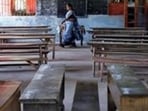 A staff member walks inside an empty classroom of a school after Kerala state government ordered the closure of schools across the state, amid coronavirus fears, in Kochi, India March 12, 2020. REUTERS/Sivaram V (REUTERS)