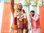 Haryana Chief Minister Nayab Singh Saini pays tributes to Atal Bihari Vajpayee during an event marking the Bharatiya Janata Party's foundation day, in Gurugram, on Monday. (PTI)