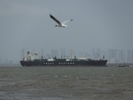 A bird flies near the Jag Vasant vessel transferring LPG at a port after transiting the Strait of Hormuz amid supply disruptions linked to the U.S-Israeli conflict with Iran, in Mumbai, India, April 1, 2026. REUTERS/Francis Mascarenhas