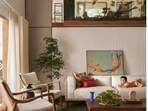 A 30-year-old home in Trivandrum has been transformed with a double-height ceiling and a built-in aquarium. (Instagram/ archpro.live)