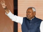 Patna: JD(U) supremo Nitish Kumar waves to the gathering during his swearing-in ceremony as the Chief Minister of Bihar.