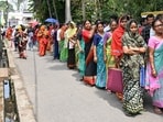 People queue up to submit their petitions before the Special Tribunal after their names were deleted from the Special Intensive Revision final voter list ahead of the West Bengal Assembly Election, at Ranaghat town, in Nadia, Monday, April 6, 2026.