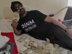 Screengrab of the 19-second video showing accused “celebrating” illicit gain. (Sourced)