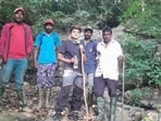 Sharanya (centre) arrived alone from Kerala on Thursday and was staying at a homestay in Kakkabbe village, about 10 km from Napoklu. Seen here in photo with her rescuers.