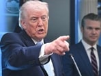 US President Donald Trump, alongside Secretary of Defense Pete Hegseth, speaks about the conflict in Iran in the James S. Brady Press Briefing Room of the White House on April 6, 2026, in Washington, DC. (Photo by SAUL LOEB / AFP)