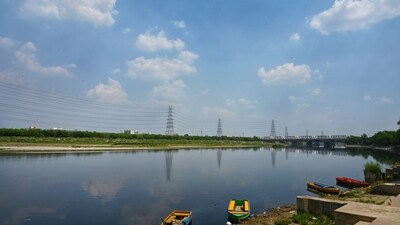 Gram it: Blue skies with clouds, as seen over the Yamuna river, captivate shutterbugs on an afternoon in Delhi. But as per the India Meteorological Department (IMD), residents could experience rain and thunderstorms today. (Photo: Vipin Kumar/Hindustan Times)