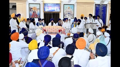 SGPC president Harjinder Singh Dhami addressing the panthic gathering organized at its headquarters Teja Singh Samundri Hall to deliberate the proposed law concerning sacrilege of Guru Granth Sahib on Monday. (HT) SGPC president Harjinder Singh Dhami addressing the panthic gathering organized at its headquarters Teja Singh Samundri Hall to deliberate the proposed law concerning sacrilege of Guru Granth Sahib on Monday. (HT)
