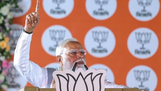 Prime Minister Narendra Modi addresses a public meeting, in Cooch Behar on Sunday. (Narendra Modi Photo Gallery/ANI Photo)