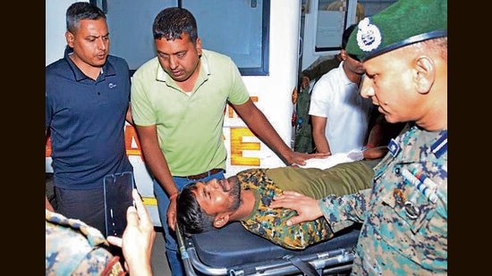 An injured CoBRA commando of the CRPF arrives at a hospital in Ranchi after being airlifted from the Saranda forest area of Chaibasa in West Singhbhum district, Monday (PTI)