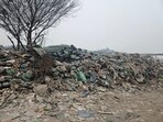 28 acres under HSVP turned into waste site; residents seek transfer to MCG for planned civic infrastructure. (HT)
