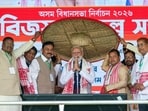 Prime Minister Narendra Modi is being felicitated during a massive public meeting in Assam's Barpeta.