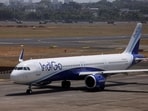 An IndiGo airlines passenger aircraft taxis on the tarmac.