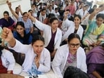 Nursing staff of the government-run Rajindra Hospital hold a protest in Patiala. (ANI File)