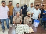 Police arrested a drug peddler and recovered heroin worth  <span class='webrupee'>₹</span>6 crore and cash of  <span class='webrupee'>₹</span>15 lakh from him in Panchkula. (Sant/ HT)