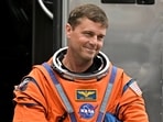 Artemis II NASA astronaut Reid Wiseman greets family members before boarding the astronaut van for the drive to launch pad 39B at the Kennedy Space Center in Cape Canaveral, Florida.