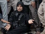 A mourning family member of a victim in the bombing of a school in US-Israeli strikes in Minab, Iran. An Iranian embassy posted this photo and wrote: “Remember this grief, this anger, this face. We will not let you go.”