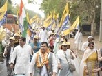 AAP leaders and supporters participate in the “Rozgar Do, Samajik Nyay Do” padyatra as it passes through Hathras district.