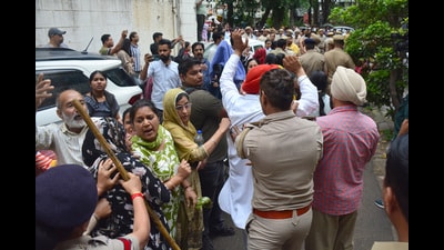 Residents protesting against Chandigarh housing board demolition drive in sector 45. (Ravi Kumar) Residents protesting against Chandigarh housing board demolition drive in sector 45. (Ravi Kumar)
