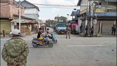 Security personnel stand guard in violence-hit Manipur. (ANI) Security personnel stand guard in violence-hit Manipur. (ANI)