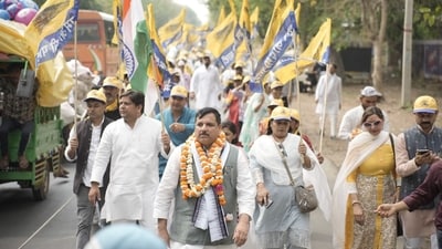 AAP leaders and supporters participate in the “Rozgar Do, Samajik Nyay Do” padyatra as it passes through Hathras district. AAP leaders and supporters participate in the “Rozgar Do, Samajik Nyay Do” padyatra as it passes through Hathras district.